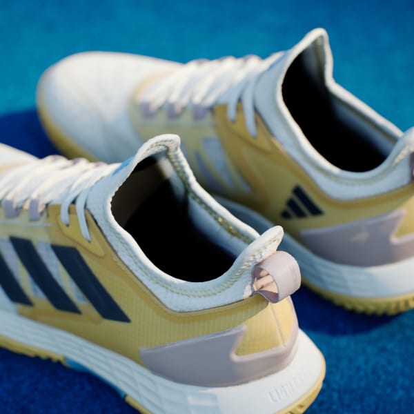 Adidas running shoes yellow top