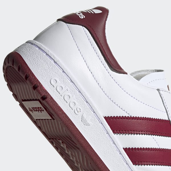 white and burgundy adidas shoes