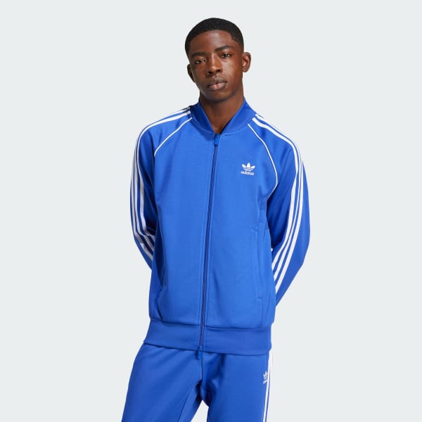 Blue adidas jacket with white stripes sale