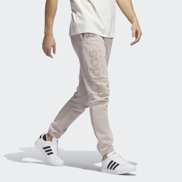 adidas Mens Essentials Fleece Tapered Cuff 3Stripes Pants Dark Grey  HeatherBlack Medium Tall  Amazonin Clothing  Accessories