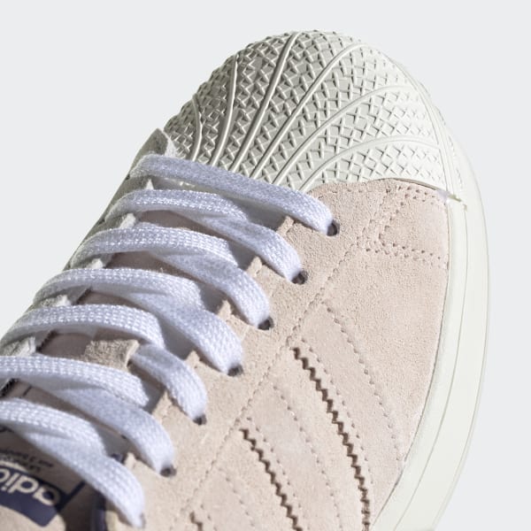 girl in adidas superstar