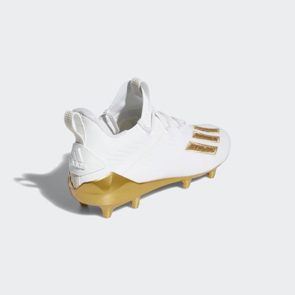 white and gold adidas football cleats