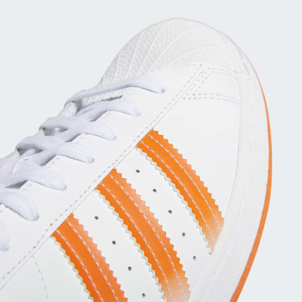 Adidas superstar clearance white and orange