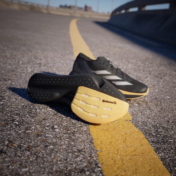 สีดำ รองเท้า Adizero Takumi Sen 10