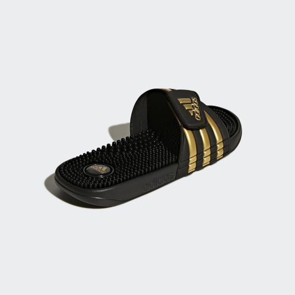 black and gold adidas slides