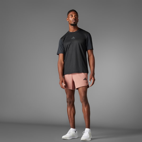 Rosa PrimeLift 3-Streifen Shorts.