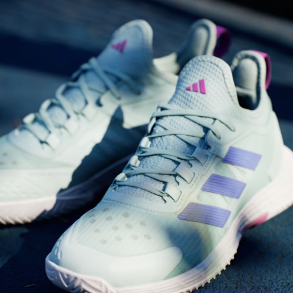 Light blue adidas tennis shoes top
