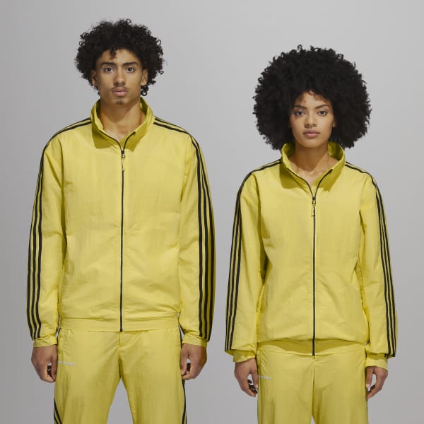 Intestinos Articulación Pelearse adidas Chaqueta Pharrell Williams Shell (Unisex) - Amarillo | adidas  Colombia