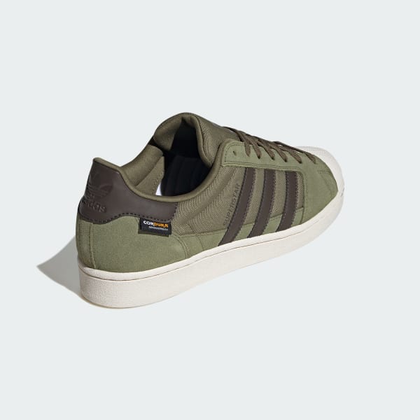 Green adidas superstar womens online