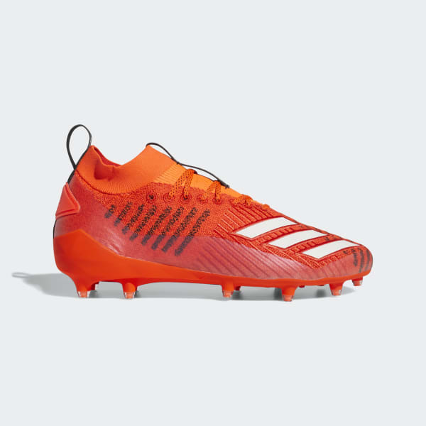 orange adidas cleats