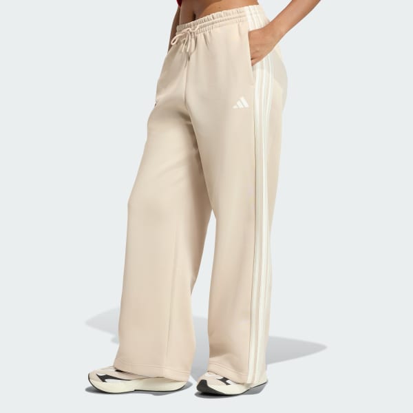 Beige pantalones deportivos Stadium 3 Franjas