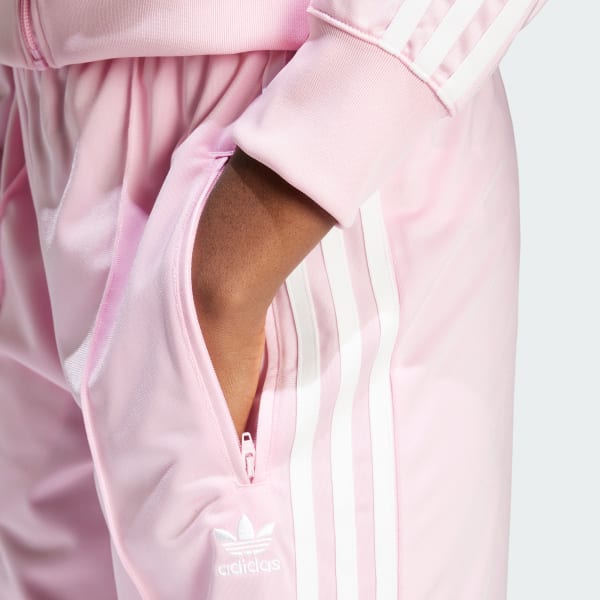adidas ファイヤーバード トラックパンツ（ジャ ージ） ピンク adidas（アディダス）の「アディカラー クラシックス ファイヤー