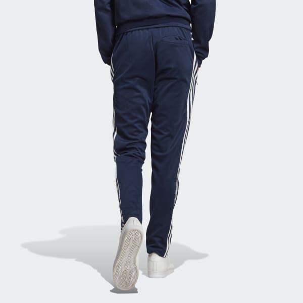 Adidas essential track pants blue sale