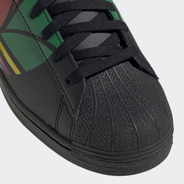 pure black adidas trainers