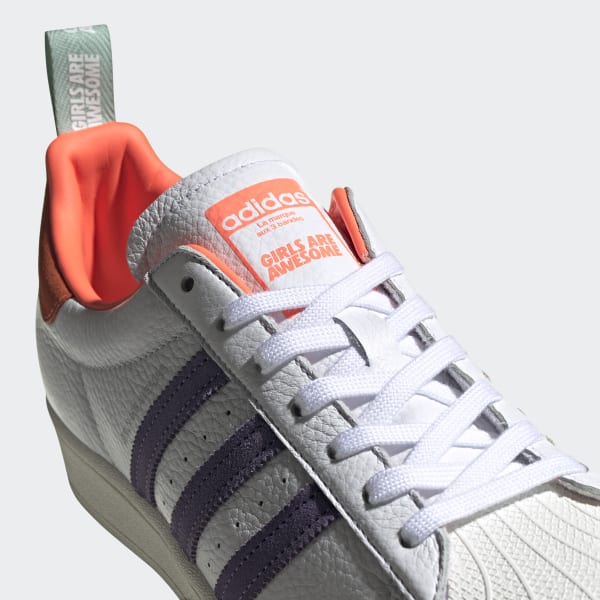 girl in adidas superstar