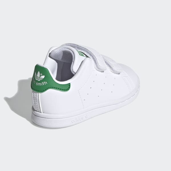White adidas with green back store