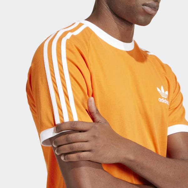 Adidas with orange stripes shop