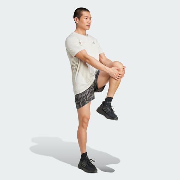 Own The Run Allover Print Shorts