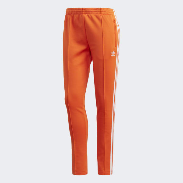 Pantalón SST - Naranja adidas | adidas Peru