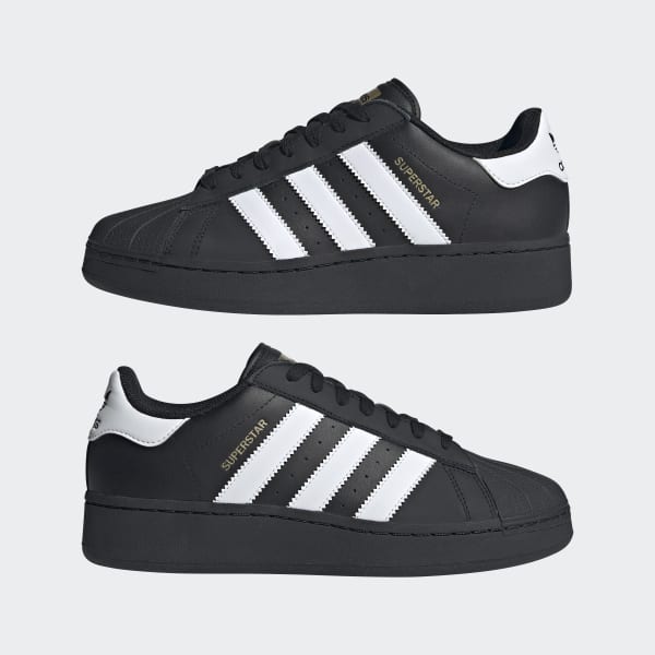 Adidas superstar black wearing clearance