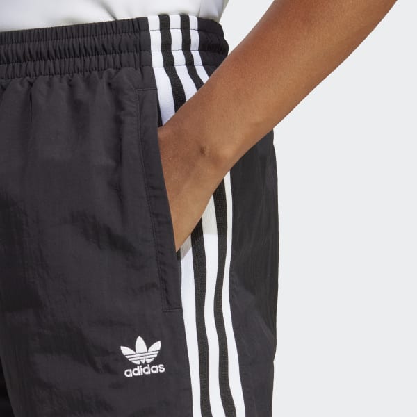 Adidas originals adicolor locked up logo track pants in black top