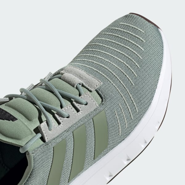 Green adidas swift run shoes top