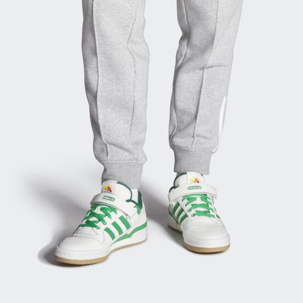 White adidas shoes with green top