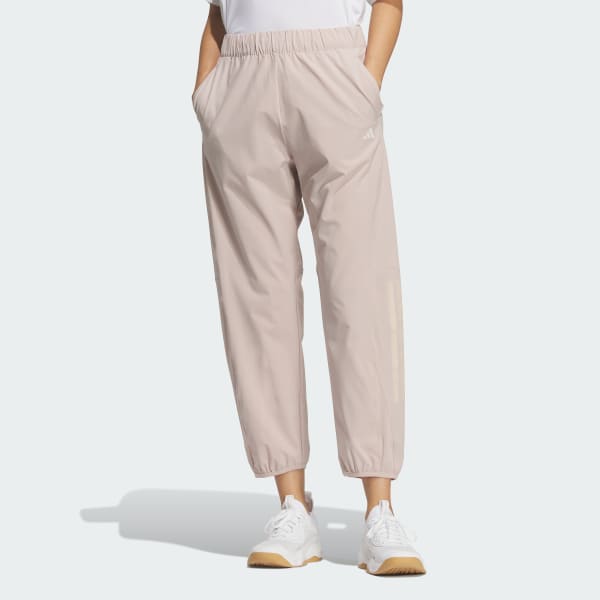 ブラウン トレーニング エッセンシャルズ プラス ルーズフィット ストレッチ ウーブン 9/10 テーパードパンツ