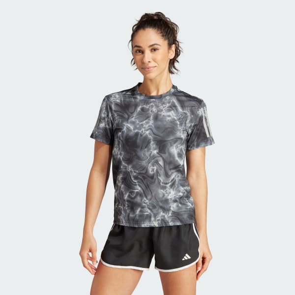 Blanco Polo Own the Run Estampado