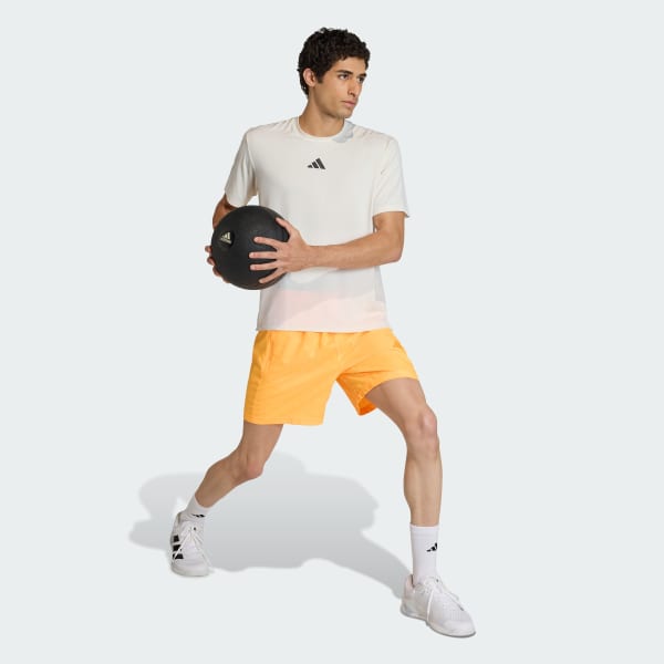 Oransje WORKOUT ESSENTIALS BRANDLOVE WOVEN SHORTS