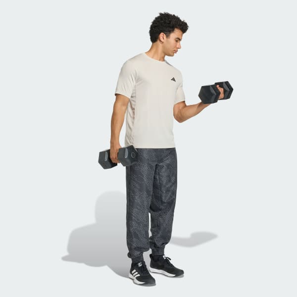 สีเบจ เสื้อยืด WORKOUT ESSENTIALS BASE