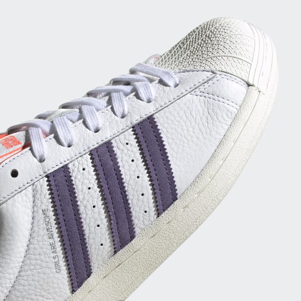 girl in adidas superstar