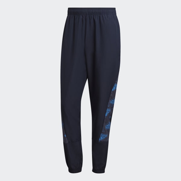 Bla Woven Allover Print træningsdragt UV642