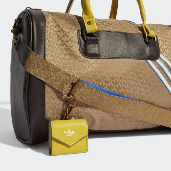 adidas Originals 'adicolor 70s' unisex monogram duffle bag in brown