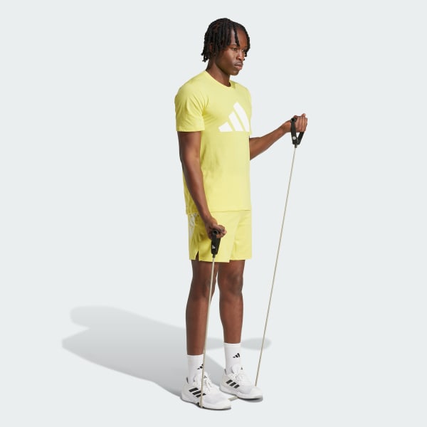 สีเหลือง เสื้อยืดเทรนนิง Train Essentials Feelready Logo