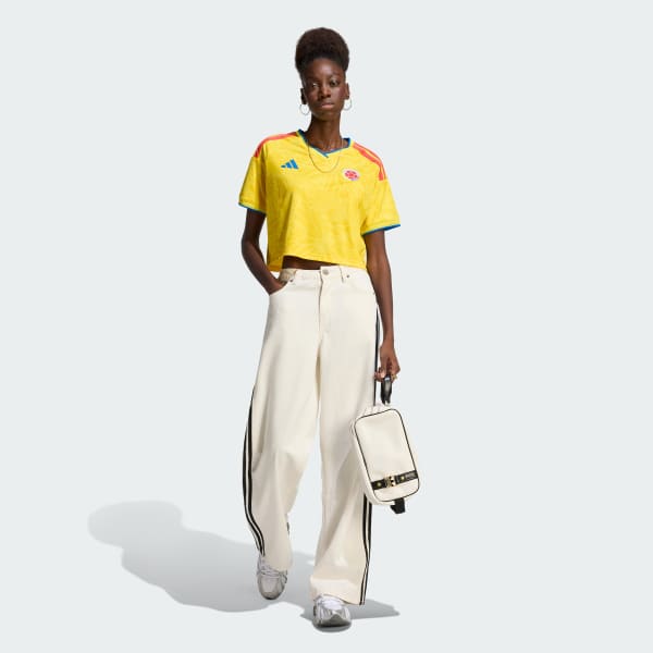 Amarillo Camiseta versión fan por encima de la cintura de local de Colombia 2026