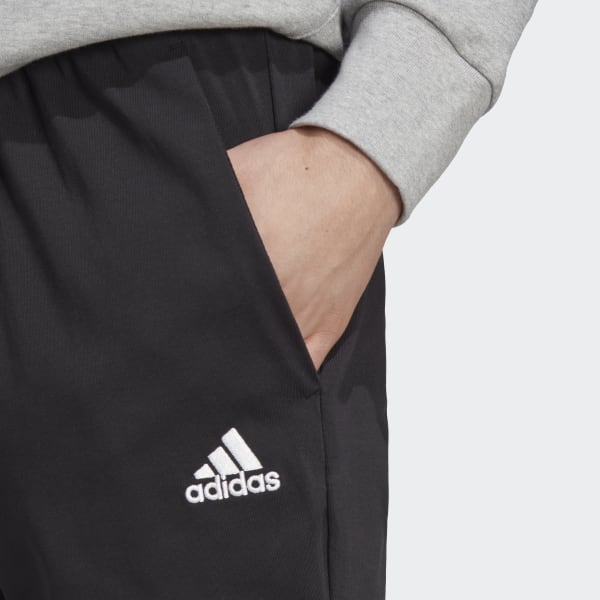 Negro Pants Essentials Tejido Jersey Pierna Cónica Dobladillo Abierto