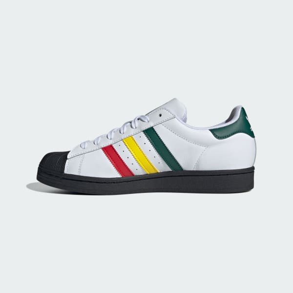 White adidas shoes hotsell with rainbow stripes