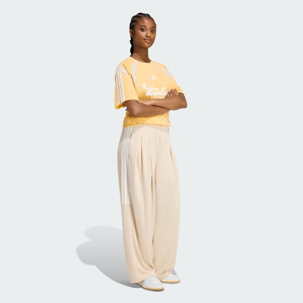 ベージュ ティロ スリーストライプス プリーツ パンツ