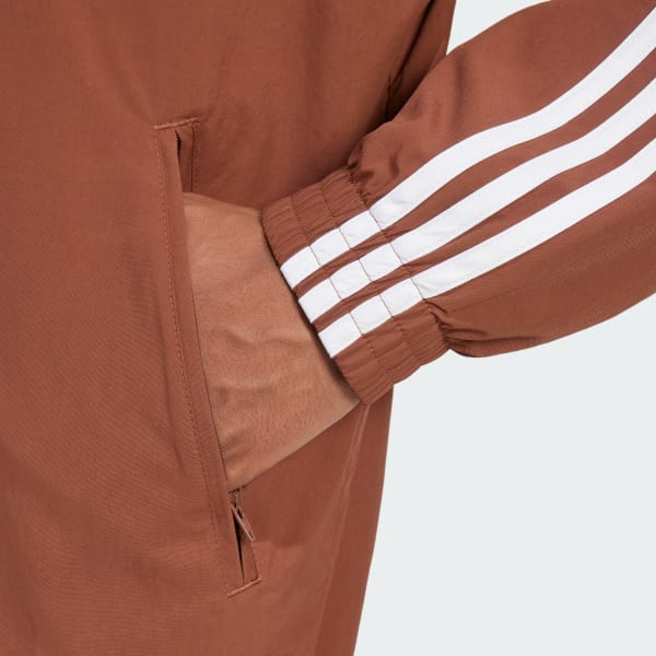 adidas 大きいサイズ　ウーブンファイヤーバードトラックトップ　ブラウン アディダス アディカラー ウーブン ファイヤーバード トラック