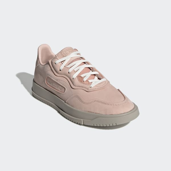 light pink adidas tennis shoes