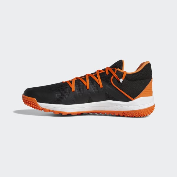 black and orange baseball turf shoes