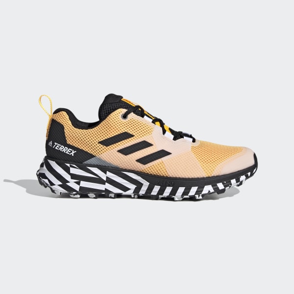 gold adidas running shoes