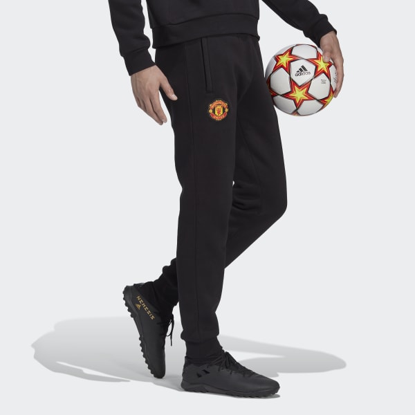 Svart Manchester United Essentials Trefoil Tracksuit Bottoms BV885
