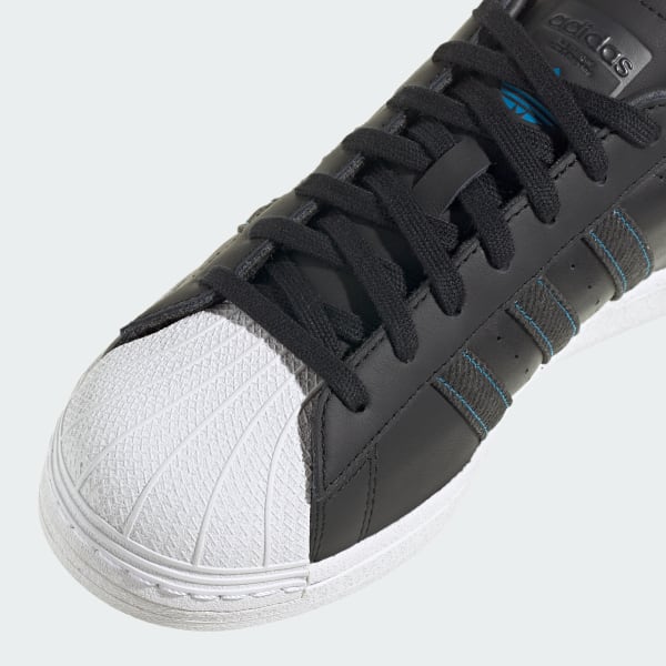 Superstar adidas negros cheap
