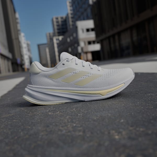 White Supernova Rise Running Shoes