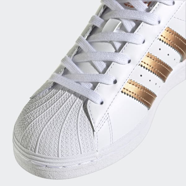 Zapatillas Superstar blancas y doradas para | adidas España