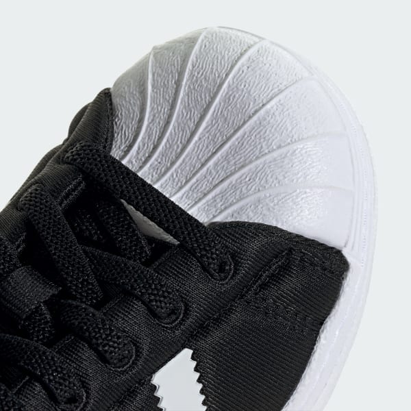 Kids adidas superstar black hotsell
