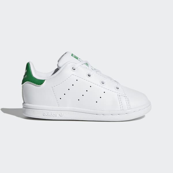 adidas white and green tennis shoes