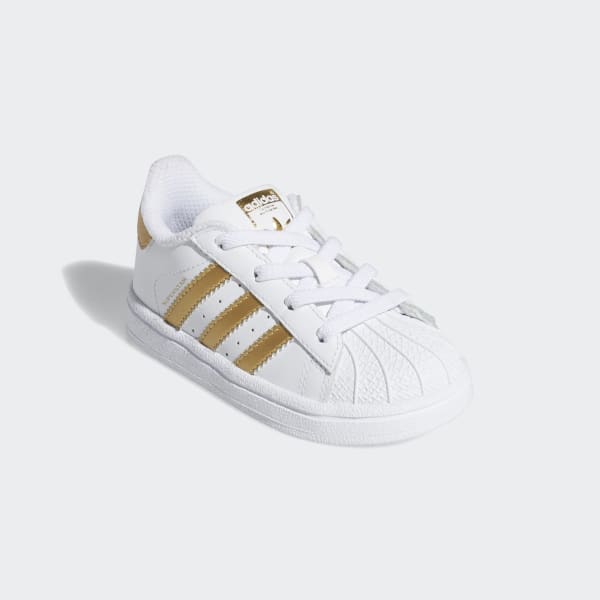 adidas white shoes gold stripes